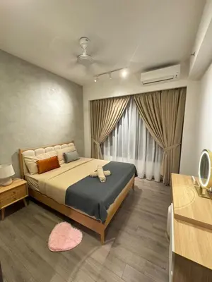 a bedroom with a bed and a large window at Agile Milestone service suite TRX by KL in Kuala Lumpur