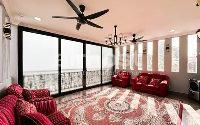 a living room with red furniture and large windows at Family House at Setiawangsa by Airhost in Kuala Lumpur