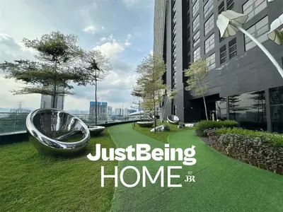 a sign that says just being home on a field of grass at Just Being Home 4pax 1BR 1BA 1Queen 1Sofa in Kuala Lumpur