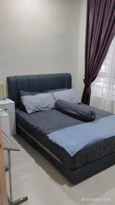 a black bed sitting in a room with curtains at Setapak KL Apt 2 Room Mus'lim in Kuala Lumpur