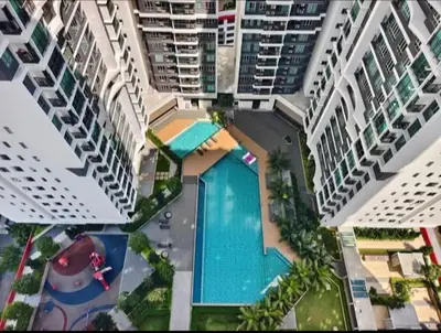 an overhead view of a pool between two buildings at Setapak KL Apt 2 Room Mus'lim in Kuala Lumpur