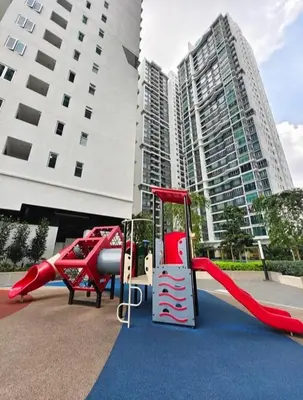 a playground in front of a tall building at Setapak KL Apt 2 Room Mus'lim in Kuala Lumpur