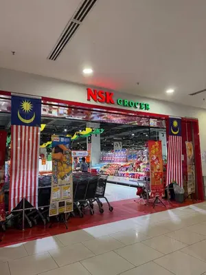 a nix grocery store with american flags in a store at Quill Residence- Minimalist Urban Condo by Azmila in Kuala Lumpur