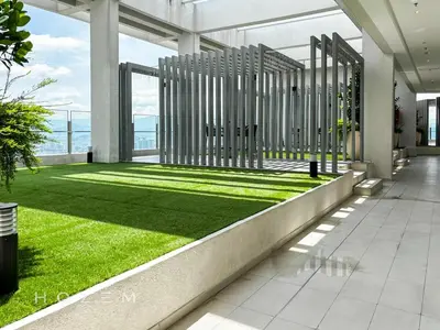 a room with a green lawn in a building at SBR1B Hozem KL2601 Apartment Bukit Bintang in Kuala Lumpur