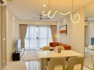 a dining room and living room with a table and chairs at 2BR2B Hozem KL1812 Apartment Bukit Bintang in Kuala Lumpur