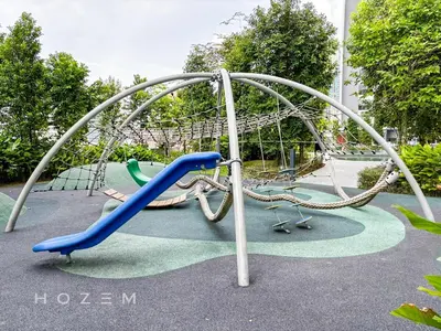 a playground with a blue slide in a park at 2BR2B Hozem KL1812 Apartment Bukit Bintang in Kuala Lumpur