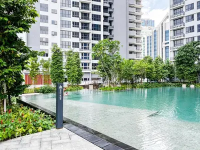 a swimming pool in a city with tall buildings at 2BR2B Hozem KL4906 Apartment Bukit Bintang in Kuala Lumpur