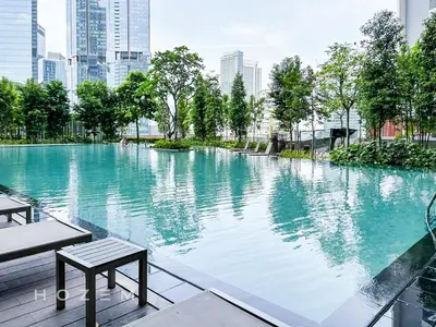 a large swimming pool in the middle of a city at 2BR2B Hozem KL4906 Apartment Bukit Bintang in Kuala Lumpur