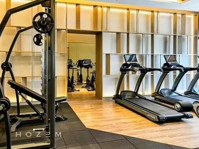 a gym with several treadmills and cardio machines at 2BR2B Hozem KL3214 Apartment Bukit Bintang in Kuala Lumpur