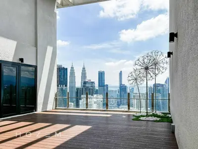 a balcony with a view of a city skyline at 2BR2B Hozem KL3214 Apartment Bukit Bintang in Kuala Lumpur
