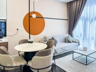 a living room with a table and chairs and a couch at 2BR2B Hozem KL2903 Apartment KLCC in Kuala Lumpur