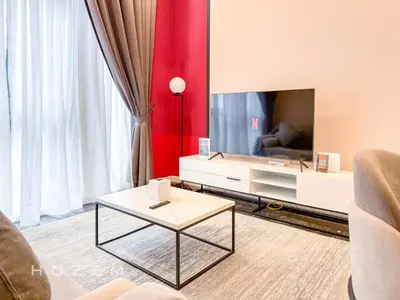 a living room with a tv and a coffee table at 2BR2B Hozem KL2903 Apartment KLCC in Kuala Lumpur