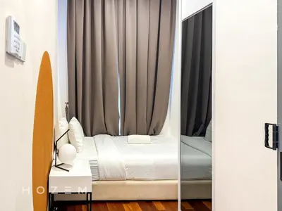 a bedroom with a bed with a window at 2BR2B Hozem KL2903 Apartment KLCC in Kuala Lumpur