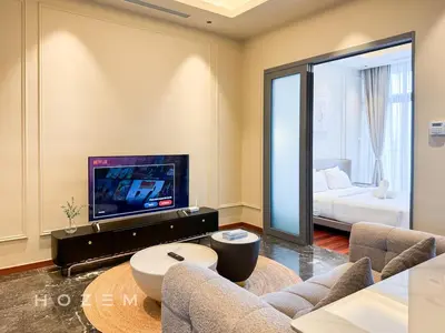 a living room with a couch and a tv at 2BR2B Hozem KL3802 Apartment KLCC in Kuala Lumpur