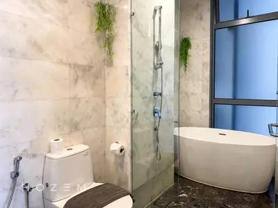 a bathroom with a toilet and a shower and a sink at 2BR2B Hozem KL3709 Apartment KLCC in Kuala Lumpur