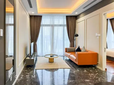 a living room with a couch and a tv at 2BR2B Hozem KL4910 Apartment KLCC in Kuala Lumpur