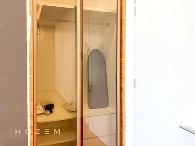 a closet with a glass door with a shelf at 2BR2B Hozem KL4910 Apartment KLCC in Kuala Lumpur