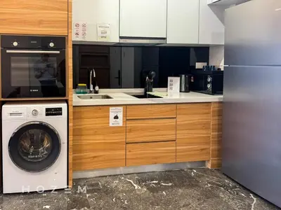 a kitchen with a washer and a washing machine at 2BR2B Hozem KL5009 Apartment KLCC in Kuala Lumpur