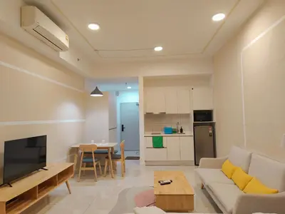 a living room with a couch and a table at Chambers Residence by Golden Homestay in Kuala Lumpur