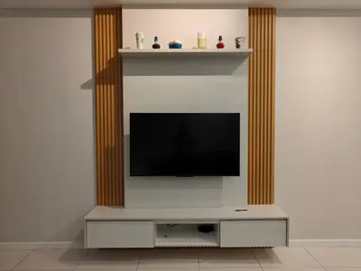 a living room with a television and a fireplace at Chambers Residence by Fancy House in Kuala Lumpur