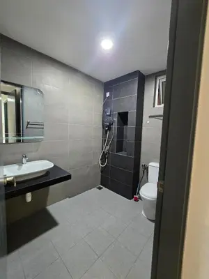 a bathroom with a sink and a toilet at Inspirasi Mont Kiara Cozy Homestay with Pool View Kuala Lumpur in Kuala Lumpur