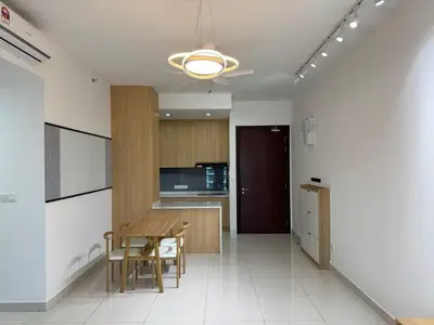 a dining room and kitchen with a table and chairs at Mont kiara warmly 6 pax stay in Kuala Lumpur