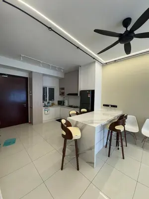 a large kitchen with a ceiling fan and chairs at 3Room 5 Pax stay in Mont Kiara in Kuala Lumpur