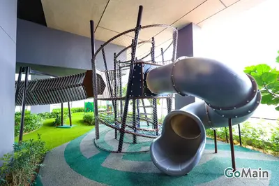 a slide on a playground in a building at AXON BUKIT BINTANG w Skypool - Walk to Pavilion KLCC KL TRX in Kuala Lumpur