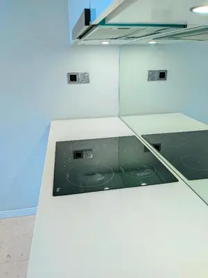 a kitchen with a counter top with a stove at Sky Suite KLCC By near klcc in Kuala Lumpur