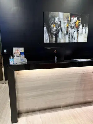 a flat screen tv sitting on top of a table at Exclusive Suites Bukit Bintang KL in Kuala Lumpur