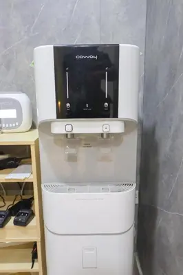 a white computer monitor sitting on top of a cpu at AQ Hotel Bukit Bintang in Kuala Lumpur