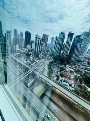 a view of a city from a skyscraper at The Platinum KLCC by Dream Suites in Kuala Lumpur