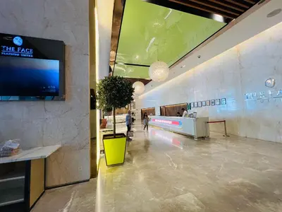 a lobby of a store with a tv on the wall at The Platinum KLCC by Dream Suites in Kuala Lumpur