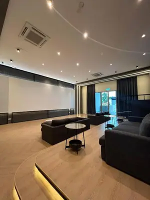a large living room with couches and a table at JMZ homestay in Kuala Lumpur