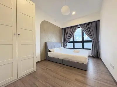 a bedroom with a bed and a large window at Agile Bukit Bintang BNB at KLCC #Located in TRX #5 mins to Pavilion &Bukit Bintang #Infinity Pool #Free Parking #中英文房东 in Kuala Lumpur
