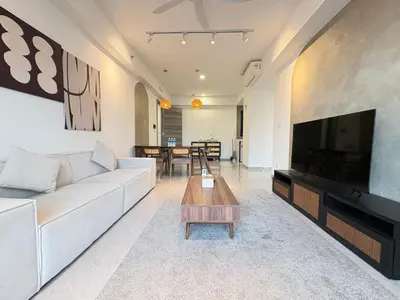 a living room with a white couch and a large television at Agile Bukit Bintang BNB at KLCC #Located in TRX #5 mins to Pavilion &Bukit Bintang #Infinity Pool #Free Parking #中英文房东 in Kuala Lumpur