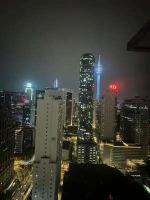 a city skyline at night with a lot of tall buildings at Park view klcc by Alan in Kuala Lumpur