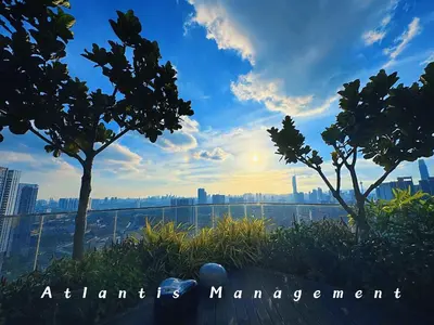 a view of a city skyline from a window with trees at Parc 3, Taman Pertama, Kuala Lumpur By Atlantis Management in Kuala Lumpur