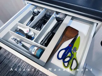 a drawer with scissors and other kitchen items in it at Parc 3, Sunway Velocity in Kuala Lumpur