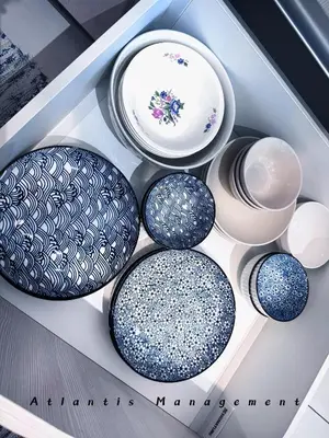 a drawer filled with blue and white plates and bowls at Parc 3, Sunway Velocity in Kuala Lumpur