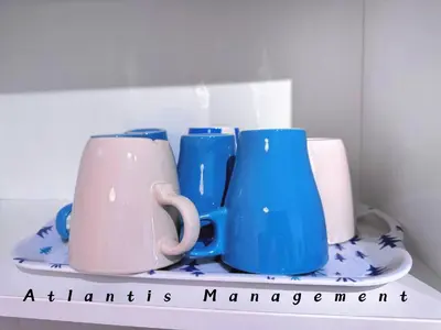 a group of blue and pink mugs on a shelf at Parc 3, Sunway Velocity in Kuala Lumpur
