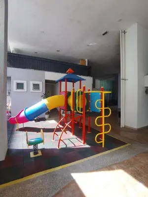 a brightly colored playground in a room at Seri Bukit Ceylon Bukit Bintang in Kuala Lumpur