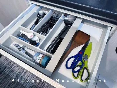 a drawer with scissors and other kitchen items in it at Parc 3 KL South Cozy Apartment, Walking Distance to AEON Maluri & Sunway Velocity in Kuala Lumpur