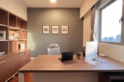 an office with a desk with a computer on it at Kuala Lumpur Digital Work Base in Kuala Lumpur