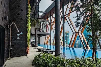 a view from the top of a building with a pool at Scarletz Luxury Suites KLCC in Kuala Lumpur