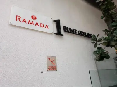a street sign for rambota and a sign for just ego at One Bukit Ceylon KLCC in Kuala Lumpur