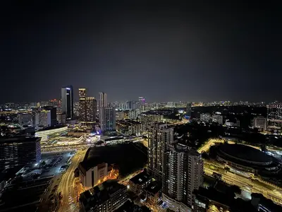 a city lit up at night with traffic at Balcony Cityscape IIII The Robertson Residence 42f in Kuala Lumpur