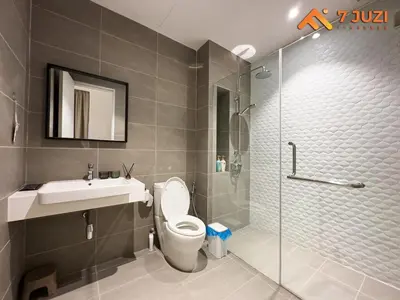a bathroom with a toilet and a sink and a shower at Quill Suite 1R1B Netflix HD1080 with Infinity Pool in Kuala Lumpur