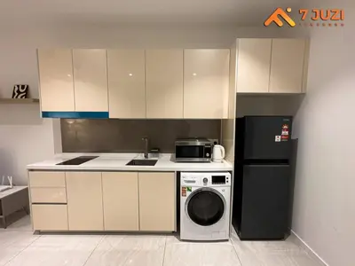 a kitchen with a washer and a stove and a refrigerator at Quill Suite 1R1B Netflix HD1080 with Infinity Pool in Kuala Lumpur