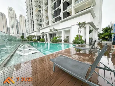 a swimming pool in a building with a chair at Quill Residence 1R1B with Netflix 23F&Massive Pool in Kuala Lumpur